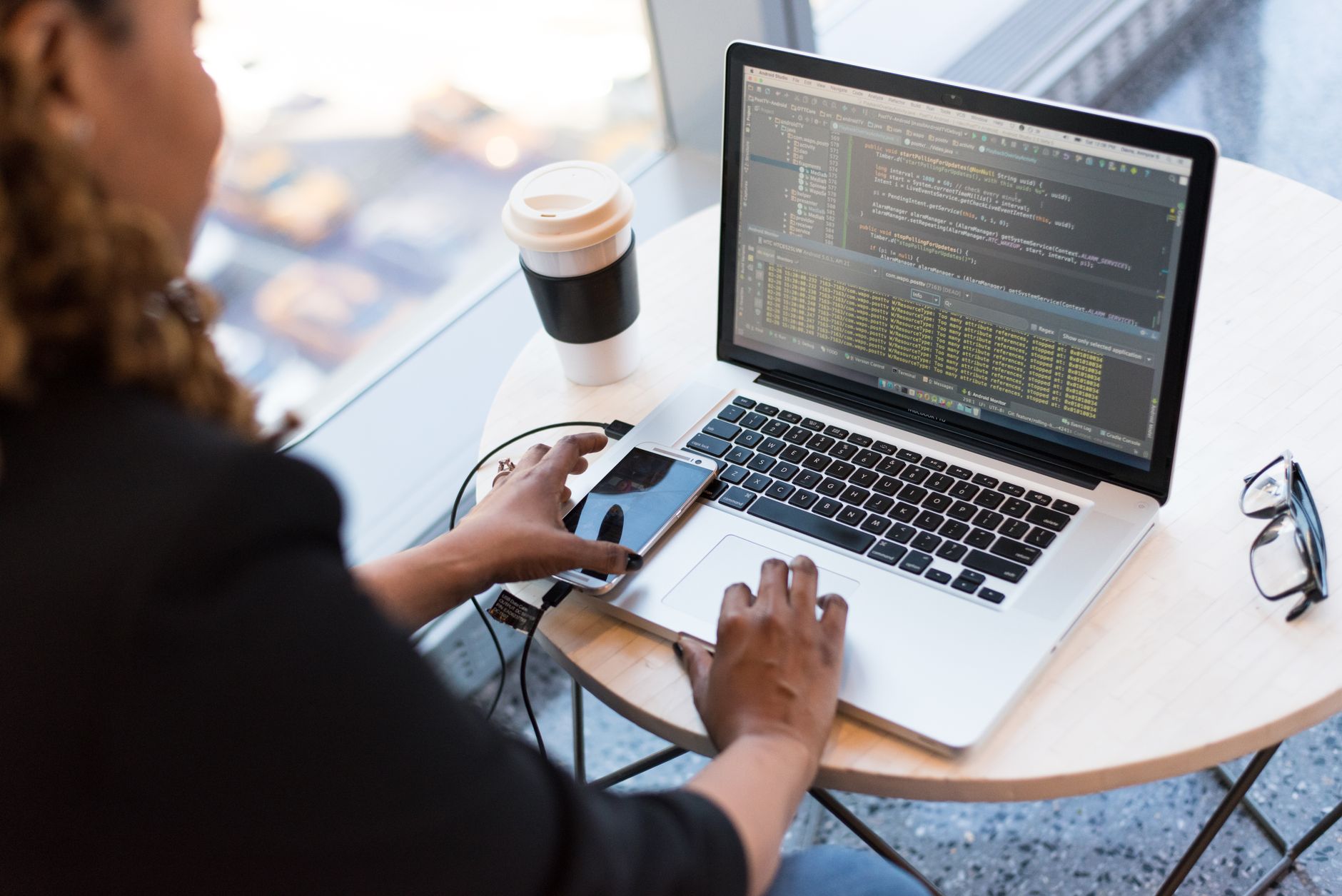 Developer reviewing ICO AI guidance UK engineering compliance requirements on a laptop